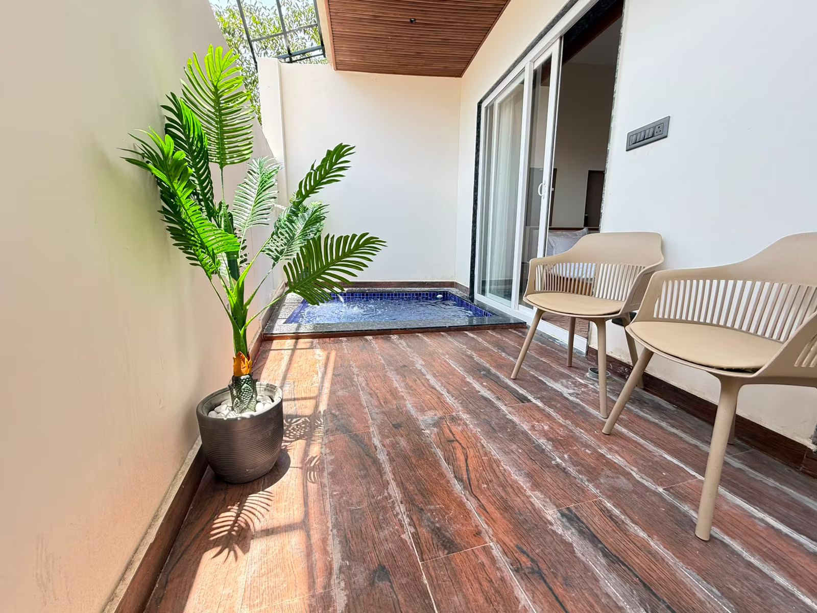 Private plunge pool terrace with lounge seating