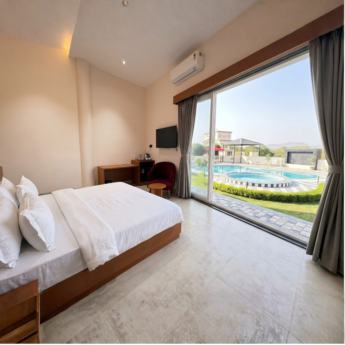 Super deluxe room with floor-to-ceiling pool views